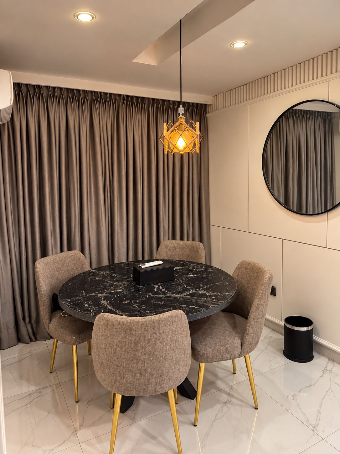Dining area with a round marble table
